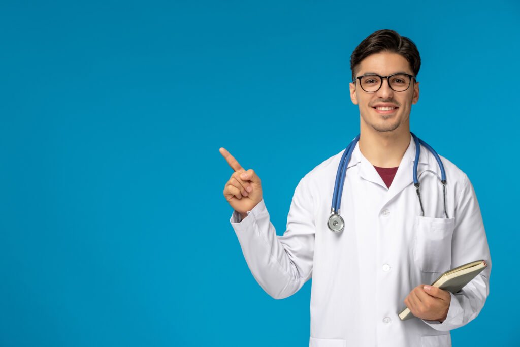 Kandivali West 19 Kandivali West doctors day cute young handsome man lab coat glasses smiling holding book