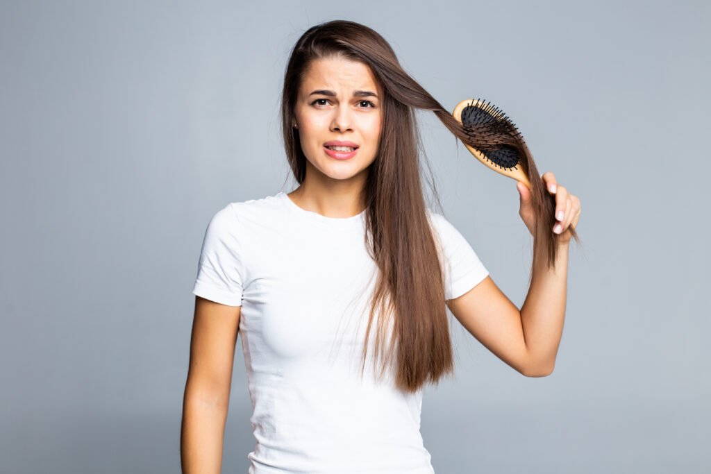 Kandivali West 20 Kandivali West young woman problems with hair split weak hair tangled hair isolated gray